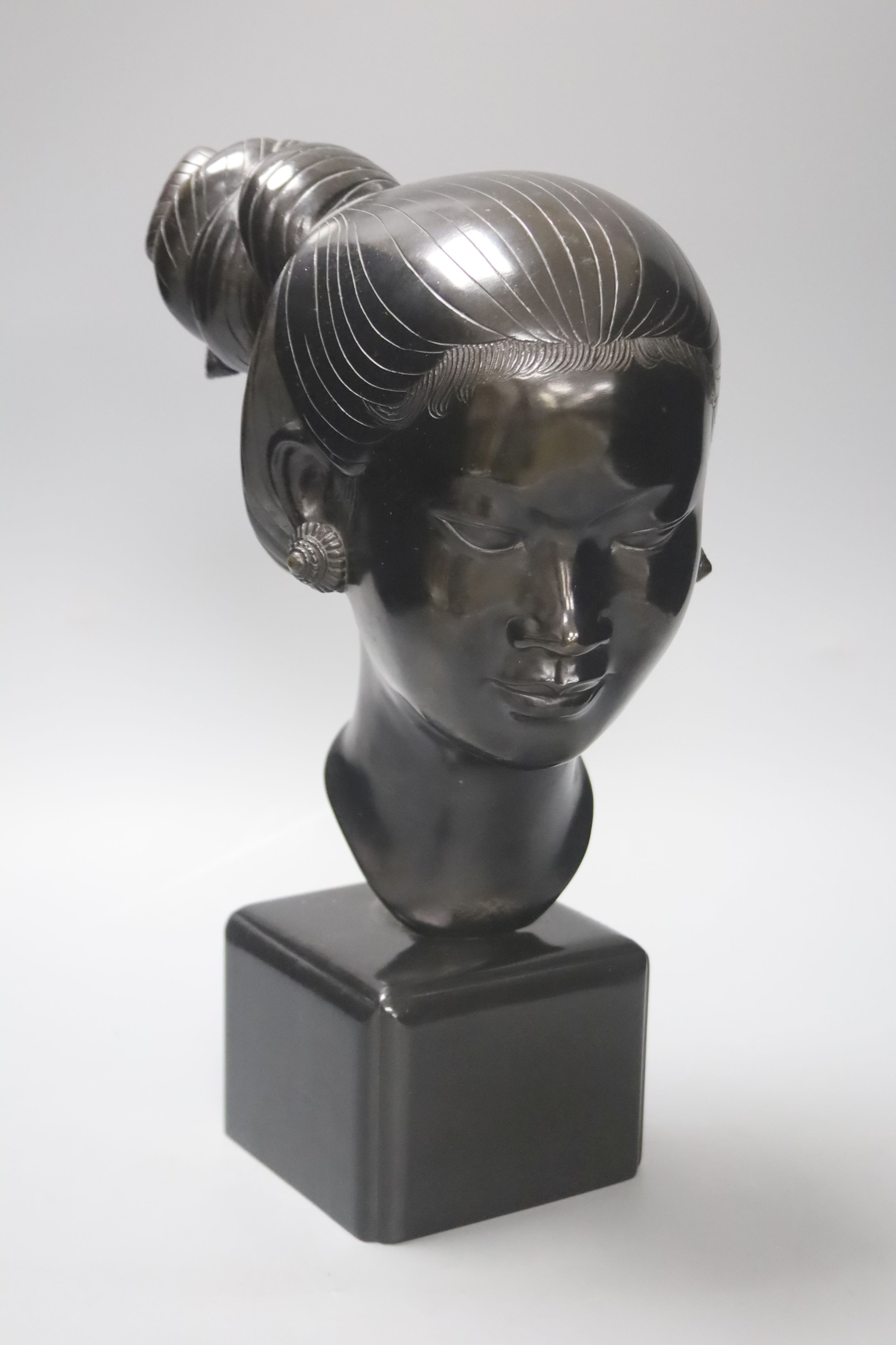 A Sino-Japanese 20th century bronze bust of a Geisha, H 22cm